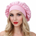 Blonde model wearing pink bonnet
